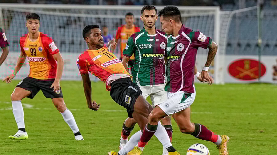 <div class="paragraphs"><p>Mohun Bagan Super Giant and East Bengal FC players vie for the ball during their Durand Cup football match, at Vivekananda Yuba Bharati Krirangan in Kolkata, Saturday, Aug. 12, 2023. </p></div>