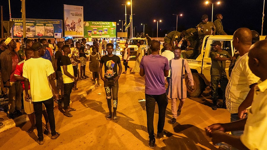 <div class="paragraphs"><p>Niger's junta supporters take part in a demonstration near an air base in Niamey, Niger, August 5, 2023. </p></div>