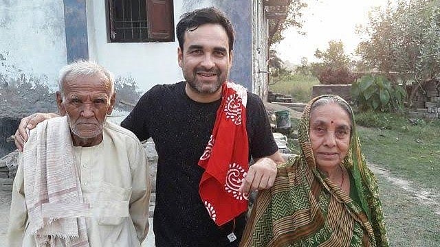 <div class="paragraphs"><p>Actor Pankaj Tripathi with his parents.</p></div>