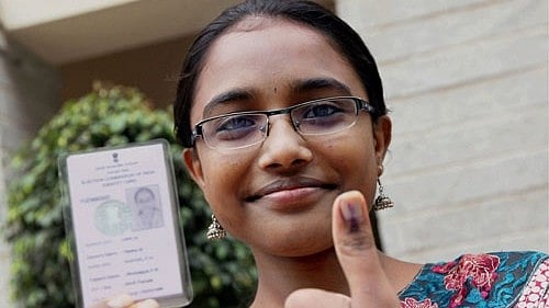 <div class="paragraphs"><p>Representative image of a first timer voter shows her inked thumb.</p></div>