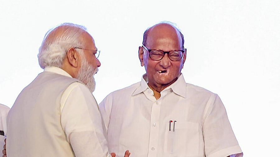 <div class="paragraphs"><p>Prime Minister Narendra Modi interacts with NCP chief Sharad Pawar.</p></div>