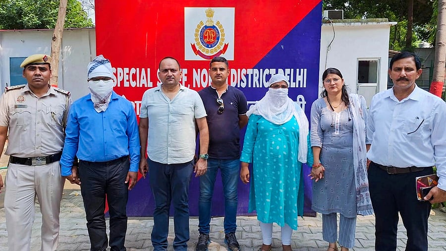 <div class="paragraphs"><p>Delhi Women and Child Department officer and his wife after being arrested by police on the charge of raping a minor girl under the POCSO Act.&nbsp;</p></div>