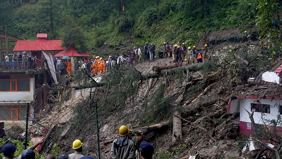 <div class="paragraphs"><p>Rescue workers remove the debris as they search for survivors after a landslide and rain in Shimla.</p></div>