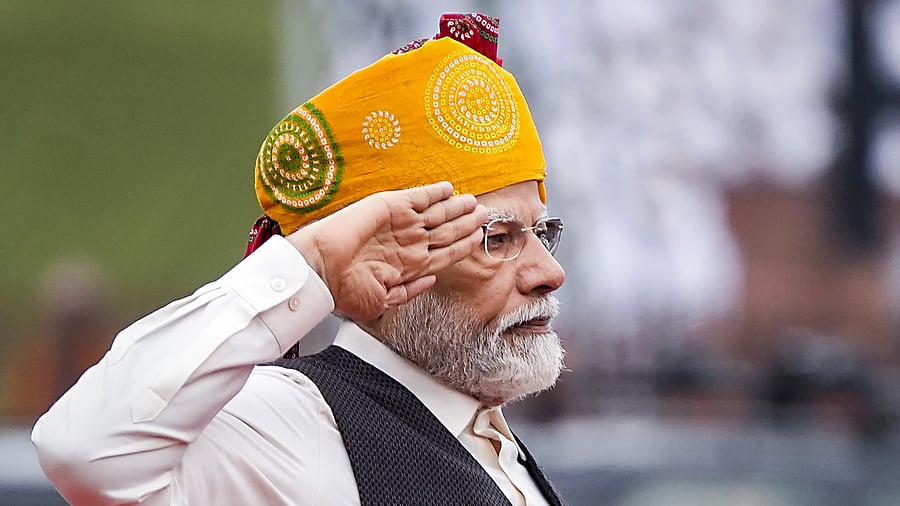 <div class="paragraphs"><p>Prime Minister Narendra Modi takes salute during the 77th Independence Day function at the historic Red Fort, in New Delhi, Tuesday, Aug. 15, 2023. </p></div>