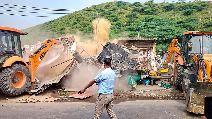<div class="paragraphs"><p>Nuh: Illegal construction being bulldozed by the authorities during the third day of the demolition drive in violence-hit Nuh district, Saturday, Aug. 5, 2023. </p></div>