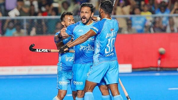 <div class="paragraphs"><p>India's captain Harmanpreet Singh celebrates with teammates after scoring a goal against Pakistan during their Asian Champions Trophy 2023 Hockey match at Mayor Radhakrishnan Hockey Stadium, in Chennai.</p></div>