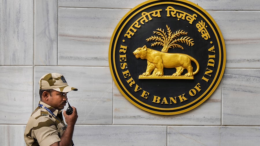 <div class="paragraphs"><p>A security personnel stands guard outside the Reserve Bank of India (RBI) headquarters, in Mumbai.&nbsp;</p></div>