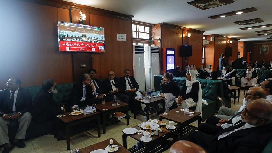 <div class="paragraphs"><p>Lawyers sit as a television screen dispays the live broadcast of the proceeding from the Supreme Court of Pakistan.&nbsp;</p></div>