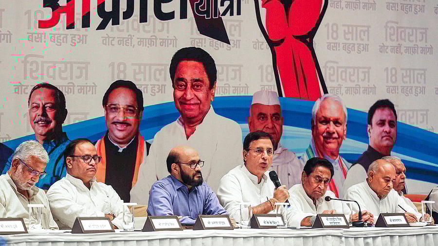 <div class="paragraphs"><p>AICC General Secretary and Congress In-charge for Madhya Pradesh Randeep Singh Surjewala with State Congress President Kamal Nath and other leaders during a press conference regarding party's 'Jan Aakrosh Yatra' in the state, in Bhopal.</p></div>