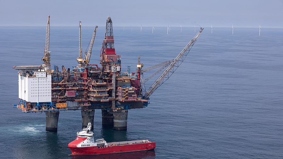 <div class="paragraphs"><p>Aerial view of the Hywind Tampen floating offshore wind farm and the Gullfaks C oil platform, which will receive power from it, North Sea</p></div>