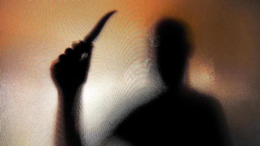 <div class="paragraphs"><p>Representative image of a person with a knife. </p></div>