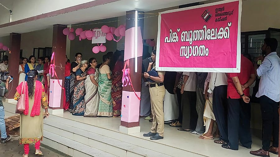 <div class="paragraphs"><p>Voters wait in a queue to cast their votes during the by-elections to Puthuppally assembly seat, in Kerala's Kottayam district.</p></div>
