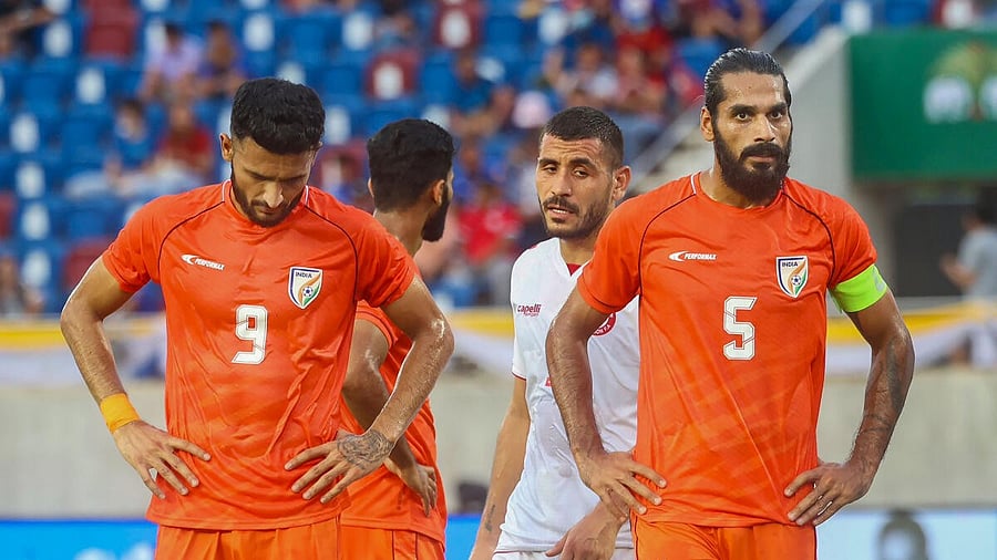 <div class="paragraphs"><p>Indian players Manvir Singh (9) and Sandesh Jhingan (5) during their King's Cup football match against Lebanon.</p></div>