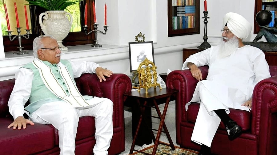 <div class="paragraphs"><p>Manohar Lal Khattar with  sect chief Gurinder Singh Dhillon.&nbsp;</p></div>