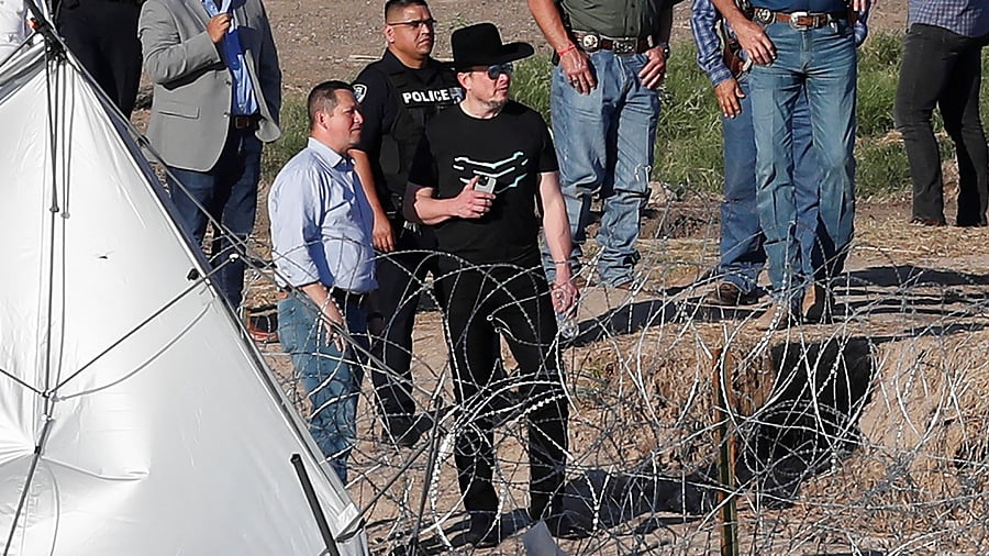 <div class="paragraphs"><p>Elon Musk views the Rio Grande river during a visit to Eagle Pass, Texas, US as migrants continue crossing into the US to seek asylum, as seen from Piedras Negras, Mexico.</p></div>