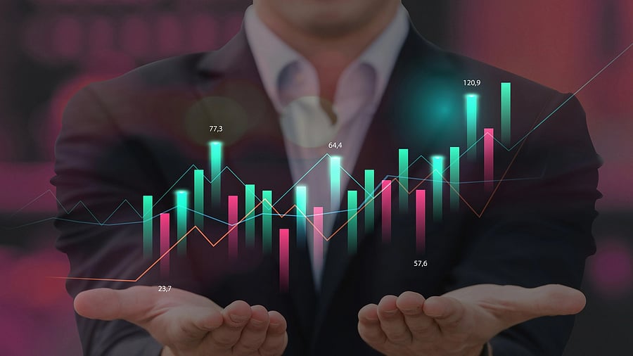 <div class="paragraphs"><p>A representational image of a businessman showing candlesticks bar and statistics data. </p></div>