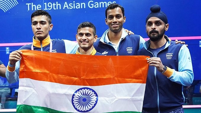 <div class="paragraphs"><p>Indian squash team.</p></div>