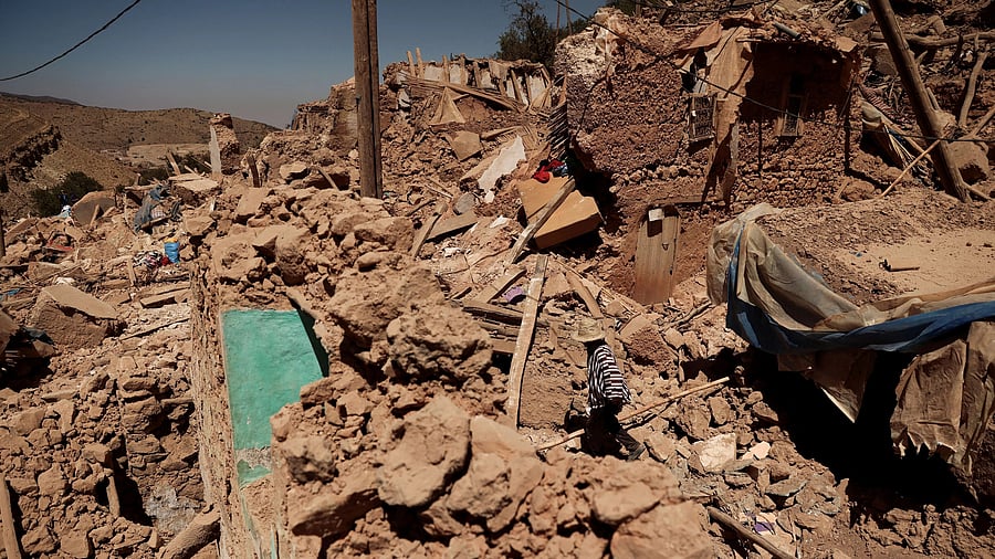 <div class="paragraphs"><p>Mohamed Ouchen, 66, a survivor, who helped to pull his sister and her husband with their children from rubble, walks near his destroyed house, in the aftermath of a deadly earthquake, in Tikekhte, near Adassil, Morocco, September 11, 2023. </p></div>