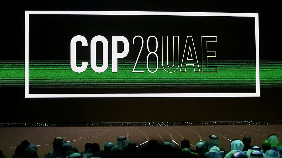 <div class="paragraphs"><p>'Cop28 UAE' logo is displayed on the screen during the opening ceremony of Abu Dhabi Sustainability Week under the theme of 'United on Climate Action Toward COP28', in Abu Dhabi, UAE on January 16, 2023. </p></div>