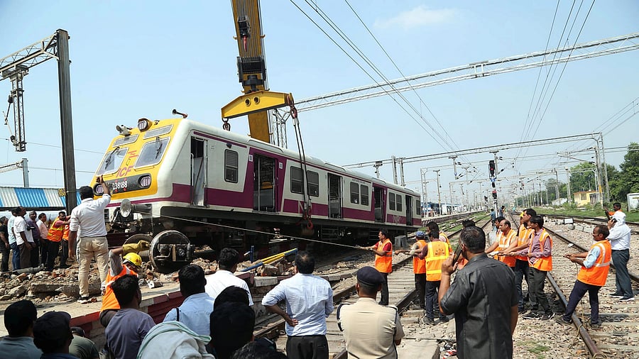 <div class="paragraphs"><p>Restoration work underway after an electric multiple unit (EMU) train climbed onto a platform at the Mathura Junction Railway Station on Tuesday, in Mathura, Wednesday.</p></div>