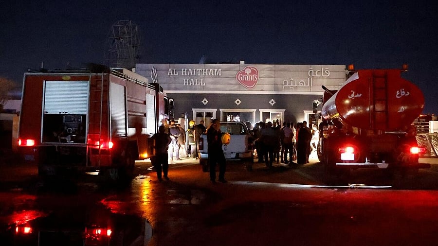 <div class="paragraphs"><p>People gather at the site following a fatal fire at a wedding celebration in Iraq's Nineveh province.</p></div>