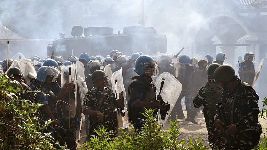 <div class="paragraphs"><p>Smoke billowing out from tear gas shells in Bishnupur district, Manipur.</p></div>