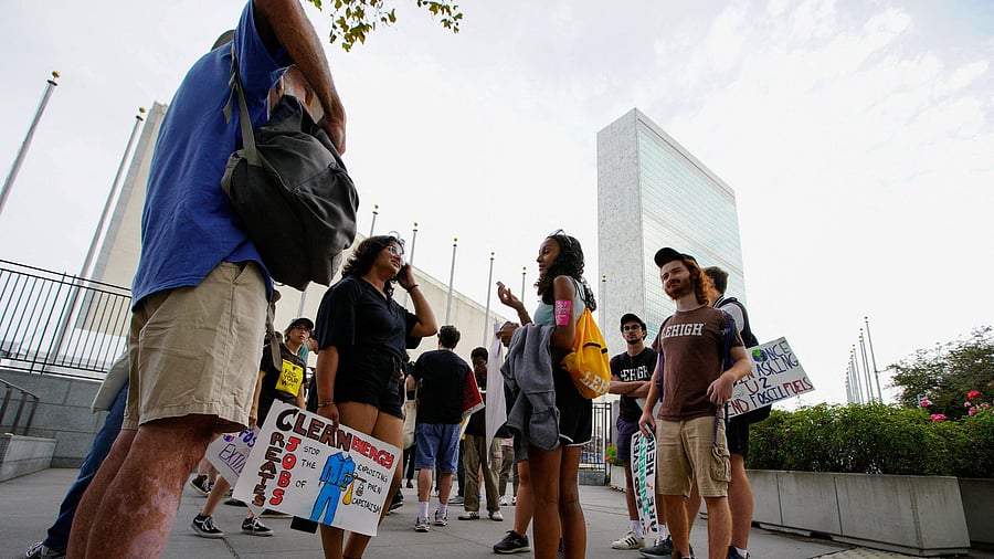<div class="paragraphs"><p>Activists gather near the United Nations building as they mark the start of Climate Week in New York during a demonstration calling for the U.S. government to take action on climate change and reject the use of fossil fuels in New York City, New York, U.S., September 17, 2023. </p></div>