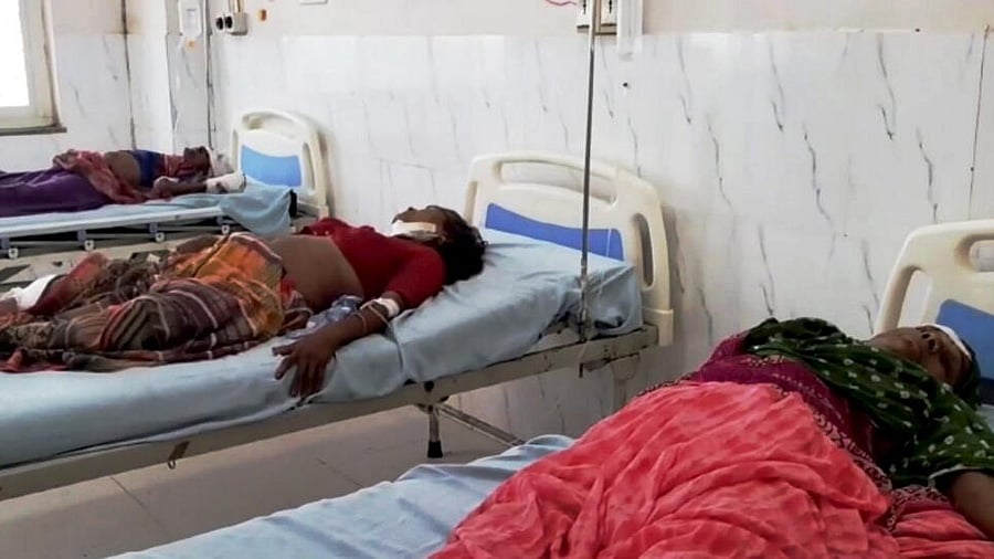 <div class="paragraphs"><p>Injured passengers being treated at a hospital after a trailer rammed into a passenger bus from behind on the Jaipur-Agra National Highway, in Bharatpur district, Wednesday, Sept. 13, 2023.</p></div>