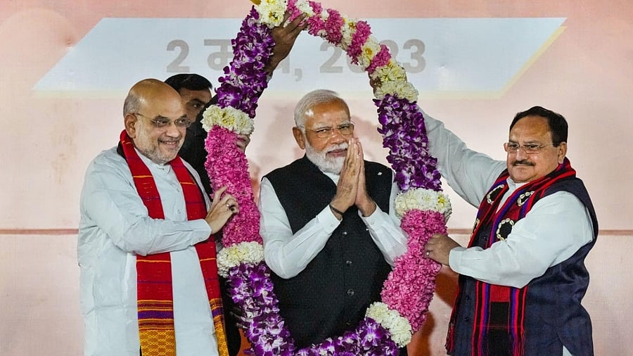 <div class="paragraphs"><p>Prime Minister Narendra Modi flanked by BJP President J P Nadda and Union Minister Amit Shah. </p></div>