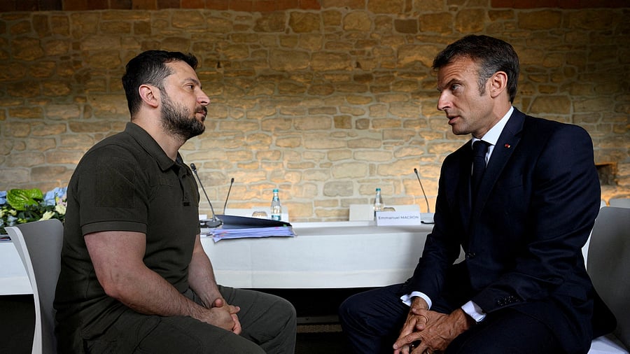 <div class="paragraphs"><p>File Photo: Ukraine's President Volodymyr Zelenskiy and French President Emmanuel Macron speak during a meeting of the European Political Community at Mimi Castle in Bulboaca, Moldova June 1, 2023. </p></div>