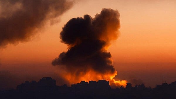 <div class="paragraphs"><p>Smoke billows following Israeli strikes amid the ongoing conflict between Israel and the Palestinian Islamist group Hamas, in Gaza.</p></div>