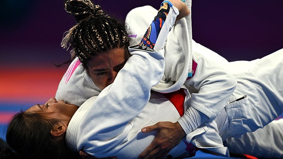 <div class="paragraphs"><p>Ju-Jitsu underway at Asian Games.</p></div>