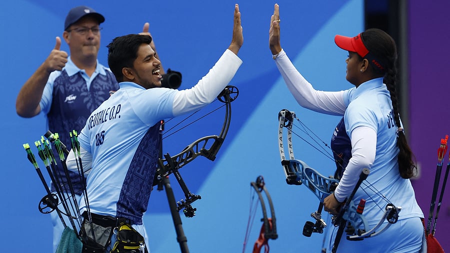 <div class="paragraphs"><p>India's Ojas Pravin Deotale and Jyothi Surekha Vennam celebrate after winning the Compound Mixed Team Gold Medal Match.</p></div>