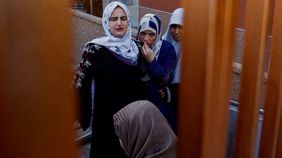 <div class="paragraphs"><p>Mourners react near the bodies of Palestinians killed in Israeli strikes during their funeral, in Khan Younis in the southern Gaza Strip October 31, 2023.</p></div>