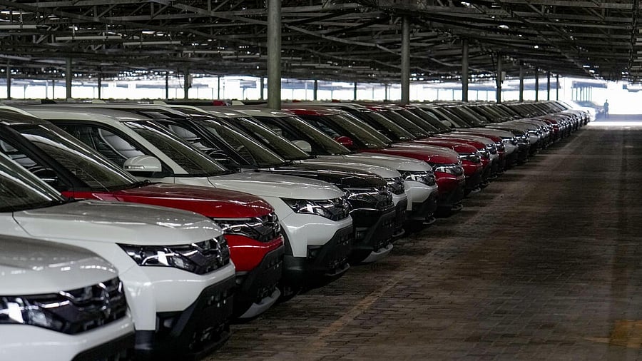 <div class="paragraphs"><p>Cars park under a solar system-embedded shed at Maruti Suzuki Plant, at Manesar in Gurugram.</p></div>