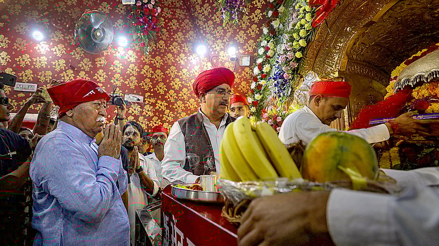 <div class="paragraphs"><p>RSS chief Mohan Bhagwat offers prayers at Kali Mata temple inside the Bahu Fort on the first day of the Navratri festival, in Jammu.</p></div>