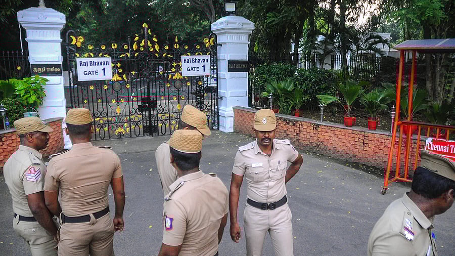 <div class="paragraphs"><p> Police personnel guard outside the Raj Bhavan after a petrol bomb was hurled outside its main gate, in Chennai, Wednesday, Oct. 25, 2023. </p></div>