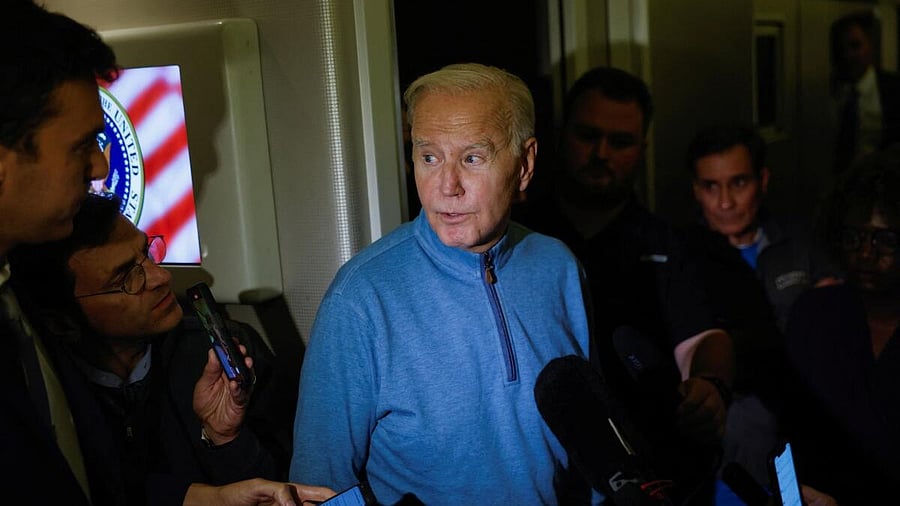 <div class="paragraphs"><p>U.S President Joe Biden speaks to the press onboard of Air Force One en route from Israel, amid the ongoing conflict between Israel and Hamas, at Ramstein Air Base, Germany, October 18, 2023.</p></div>