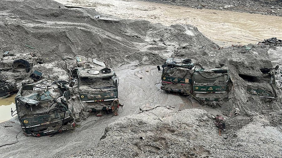 <div class="paragraphs"><p>Trucks buried in mud are seen in an area affected by flood in Sikkim in this undated handout image released by the Indian Army on October 5, 2023. </p></div>