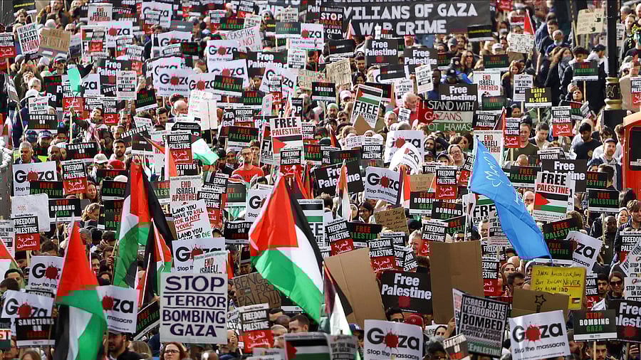 <div class="paragraphs"><p>Demonstrators protest in solidarity with Palestinians in Gaza, amid the ongoing conflict between Israel and the Palestinian Islamist group Hamas, in London, Britain, October 21, 2023.</p></div>