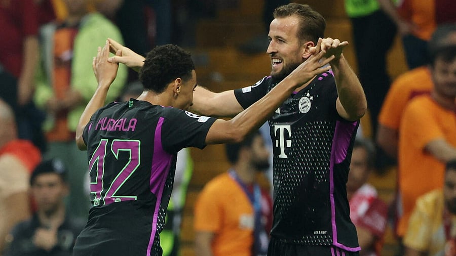 <div class="paragraphs"><p>Harry Kane (right) celebrates with Jamal Musiala (left).</p></div>