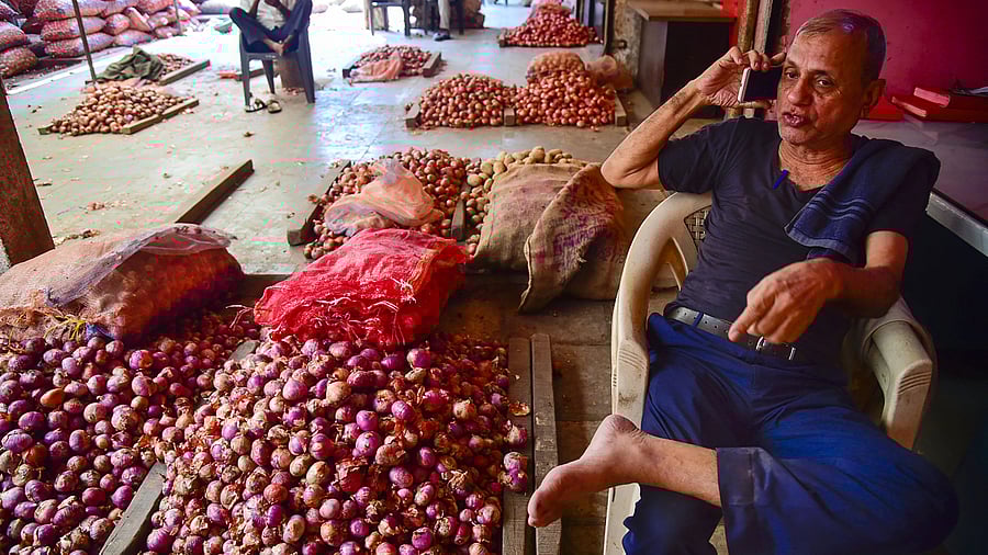 <div class="paragraphs"><p>An onion vendor waits for customers at APMC Onion-Potato Market, in Navi Mumbai, Tuesday, Oct. 31, 2023. </p></div>