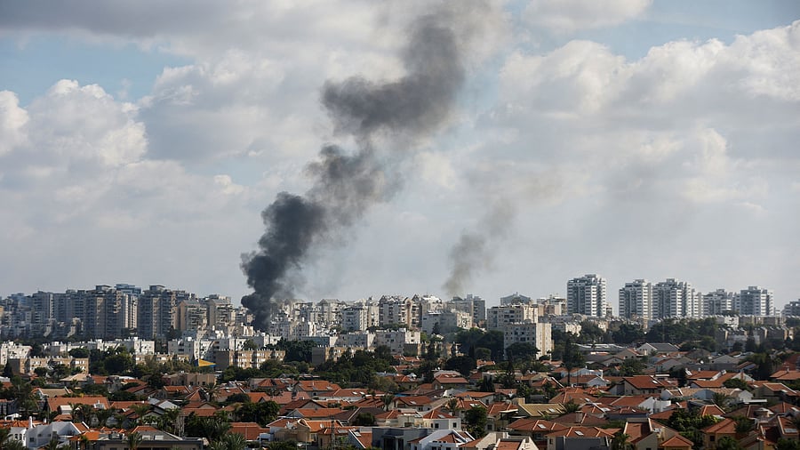 <div class="paragraphs"><p>Smoke rises in the aftermath of rocket barrages that were launched from Gaza, in Ashkelon, Israel October 7, 2023.</p></div>