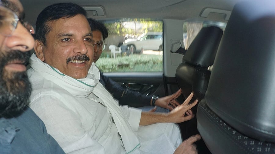 <div class="paragraphs"><p>File photo of AAP MP Sanjay Singh being taken to the Rouse Avenue Court.&nbsp;</p></div>