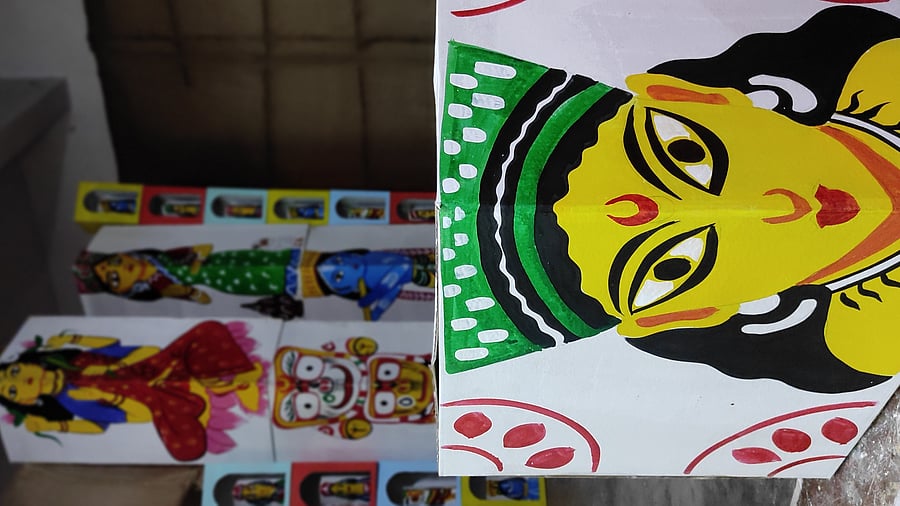 The Bengalee Association Bangalore has taken design inspiration from the wooden dolls of West Bengal.