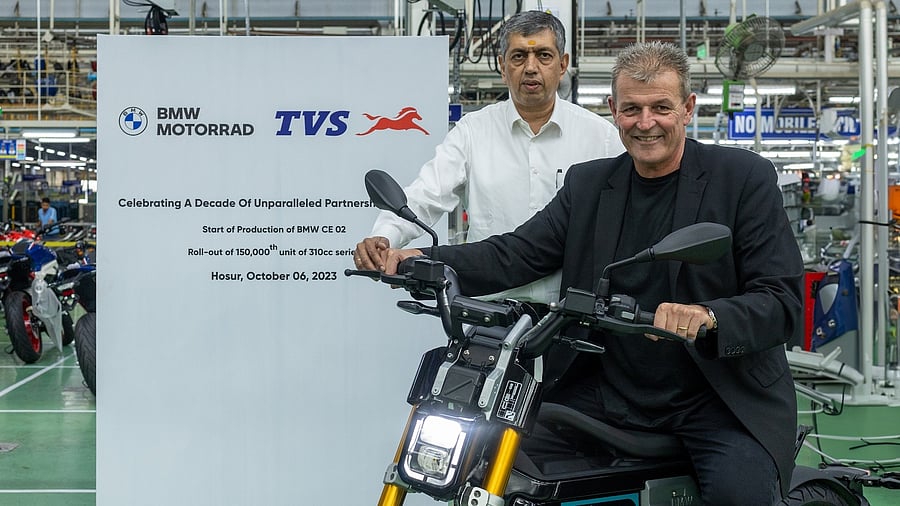 TVS Motor Company Director & CEO KN Radhakrishnan and BMW Motorrad Head Dr Markus Shramm with the BMW CE 02