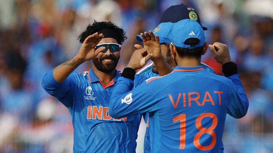<div class="paragraphs"><p> Ravindra Jadeja celebrates with teammate Virat Kohli after taking the wicket of Australia's Marnus Labuschagne, caught by K L Rahul.</p></div>