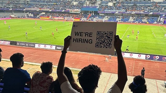 <div class="paragraphs"><p>Placard that said "we're hiring".</p></div>