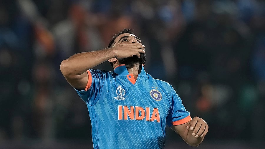 <div class="paragraphs"><p>Mohammed Shami celebrates the wicket of New Zealand's batter Daryl Mitchell during the ICC Men's Cricket World Cup 2023 match between India and New Zealand, at the HPCA Stadium in Dharamshala.</p></div>