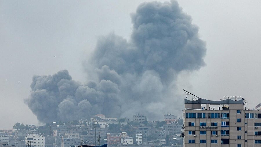 <div class="paragraphs"><p>Smoke rises following Israeli strikes in Gaza.</p></div>